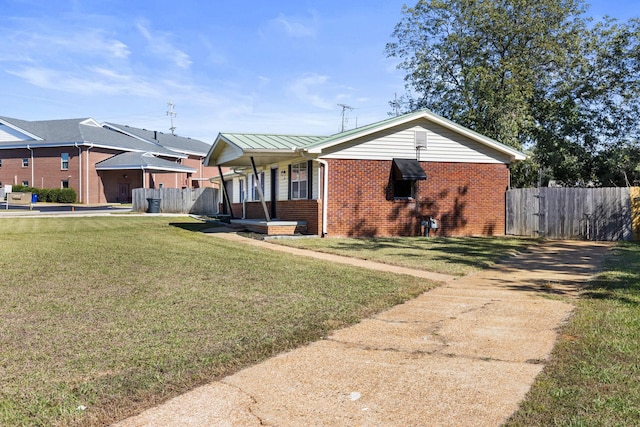 view of front of property with a porch and a front yard