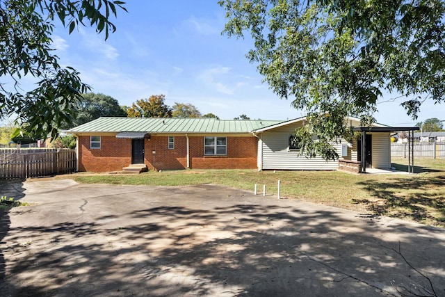 ranch-style house with a front yard