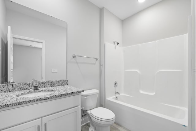 full bathroom featuring shower / tub combination, vanity, and toilet