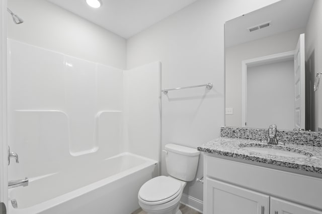 full bathroom featuring vanity, shower / bathtub combination, and toilet