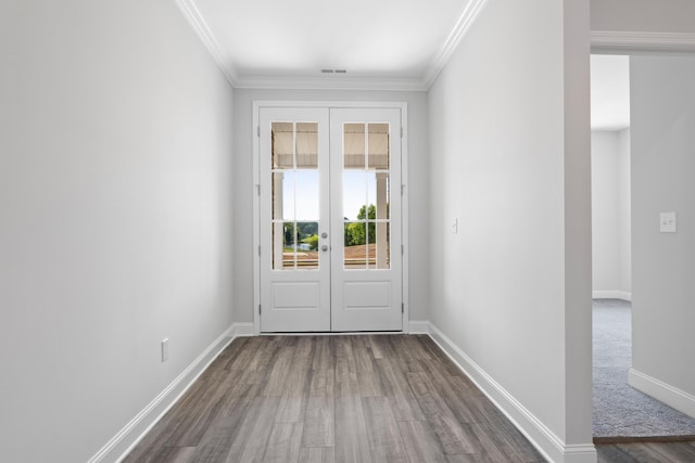 doorway to outside featuring french doors, crown molding, and a healthy amount of sunlight