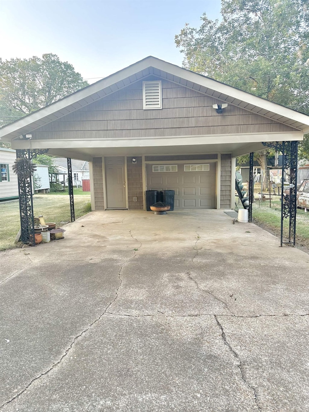 garage with a carport