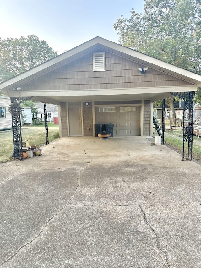 garage with a carport