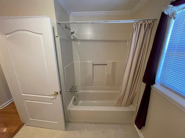 full bath with shower / tub combo, wood finished floors, and ornamental molding