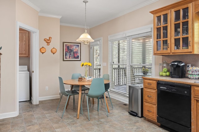 dining area with crown molding, washer / dryer, baseboards, and stone finish floors