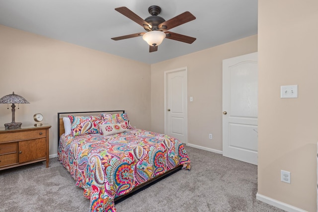 bedroom featuring carpet flooring, baseboards, and a ceiling fan
