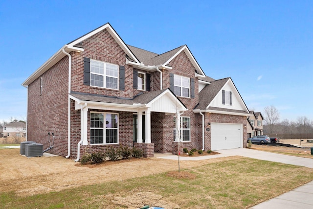 craftsman-style house featuring a front lawn and a garage