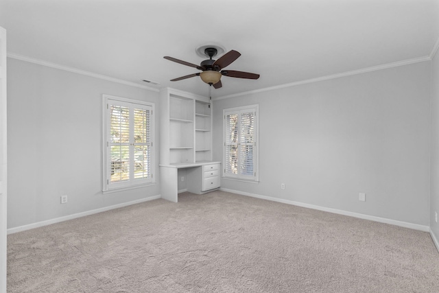 unfurnished bedroom with crown molding, ceiling fan, and light colored carpet