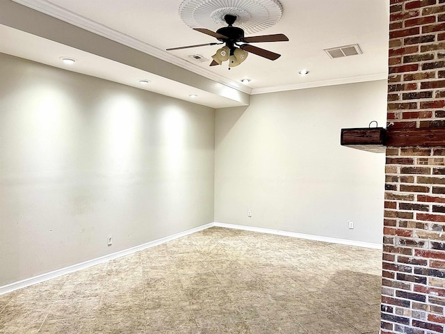 spare room featuring crown molding and ceiling fan