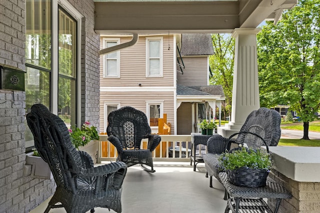  - view of patio / terrace featuring covered porch