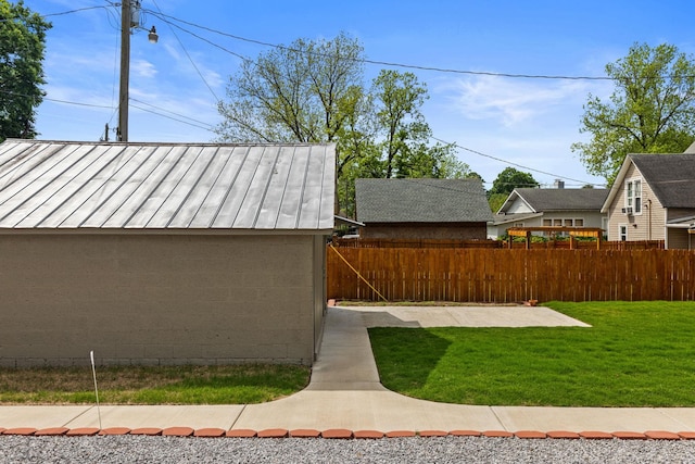 - view of yard with fence and an outdoor structure