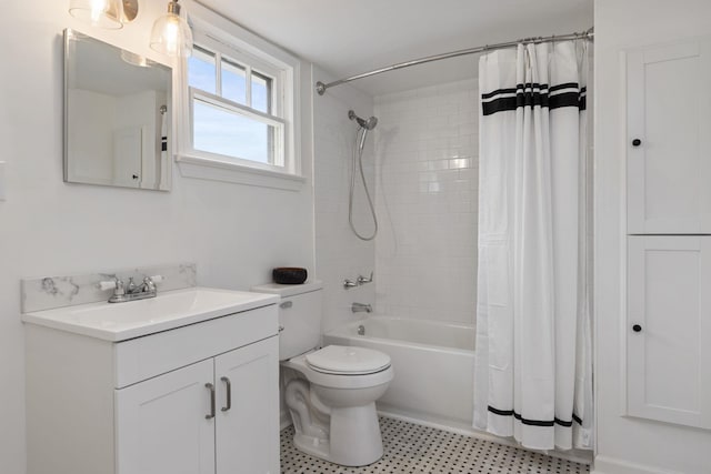  - full bathroom featuring shower / bath combo with shower curtain, toilet, and vanity