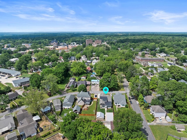  - bird's eye view featuring a view of trees and a residential view