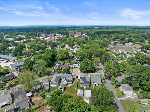  - drone / aerial view featuring a residential view and a forest view