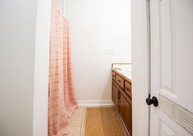 bathroom featuring vanity and tile patterned floors