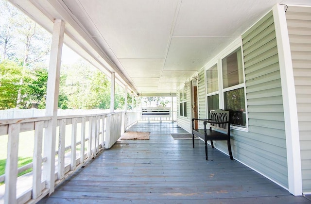 deck with covered porch