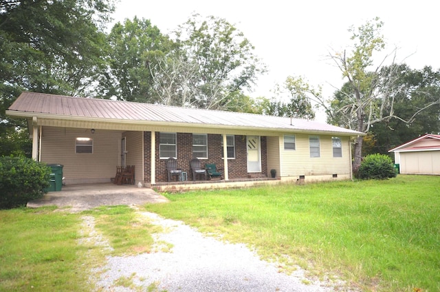 ranch-style house with a front lawn and a carport