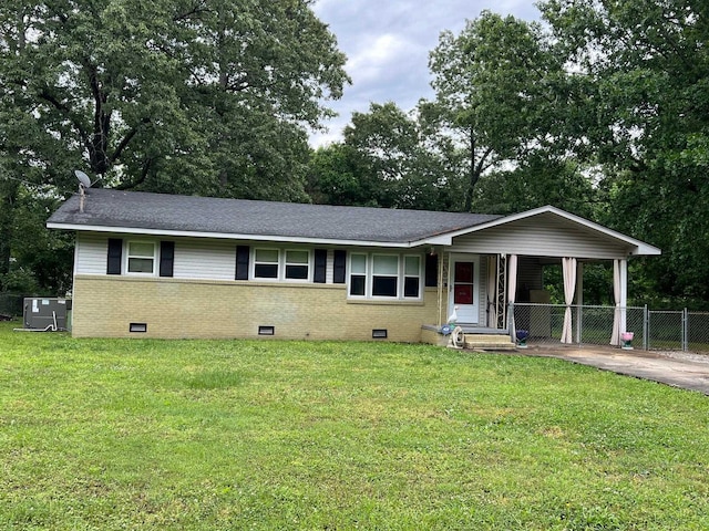 ranch-style home featuring fence, a front yard, brick siding, and crawl space