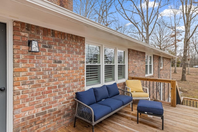 wooden deck featuring an outdoor living space