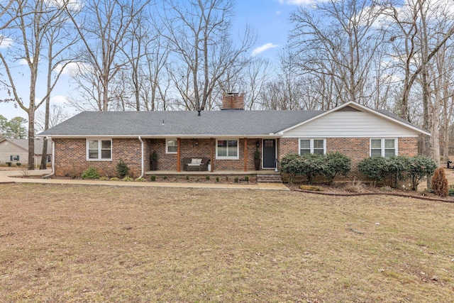 ranch-style home with a front yard