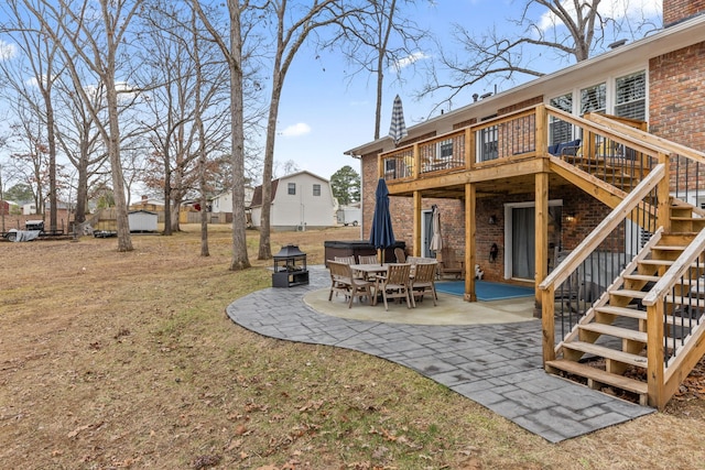 back of house with a patio area