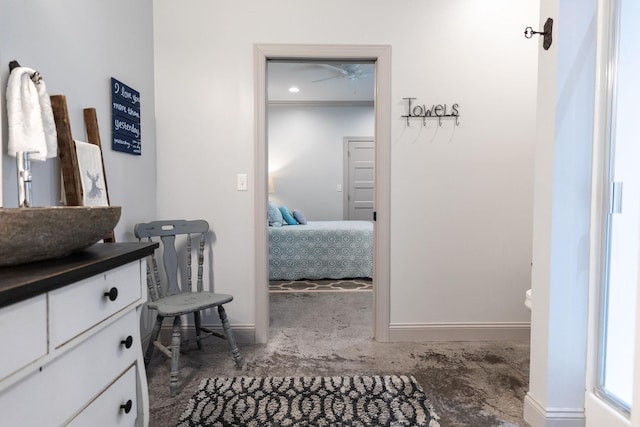 bathroom featuring vanity and ceiling fan