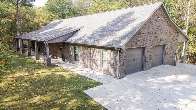 view of front facade with a front yard and a garage