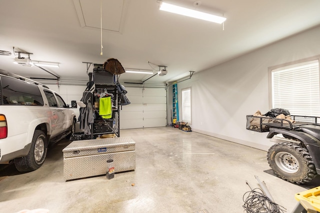 garage featuring a garage door opener