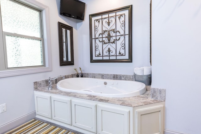 bathroom with a washtub