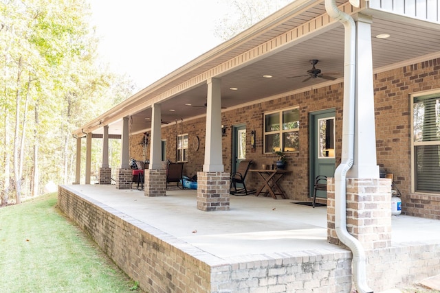 view of patio featuring ceiling fan and covered porch