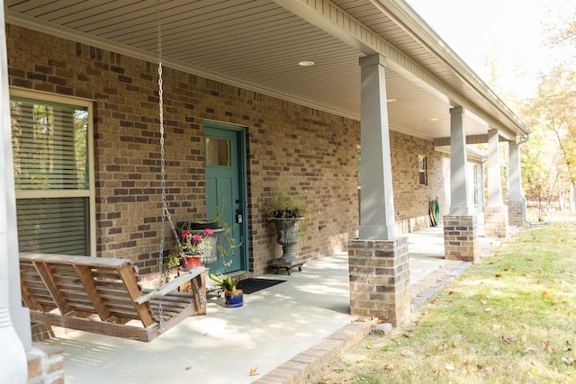 view of patio featuring a porch