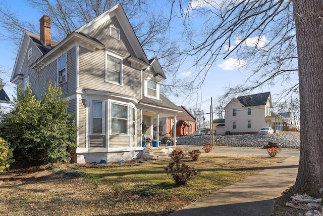 view of property exterior with a lawn