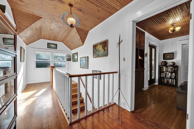 hallway featuring hardwood / wood-style floors and wooden ceiling