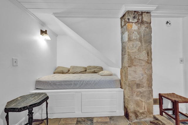 bedroom with ornamental molding