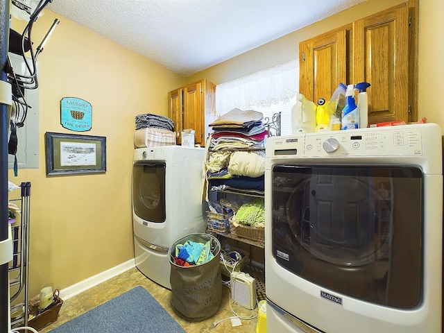 washroom with cabinets and a textured ceiling