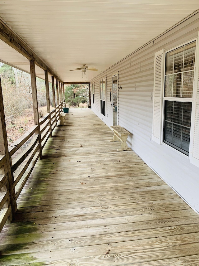 deck featuring ceiling fan and covered porch