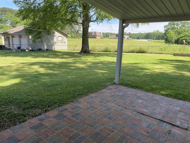  - view of yard featuring a patio area