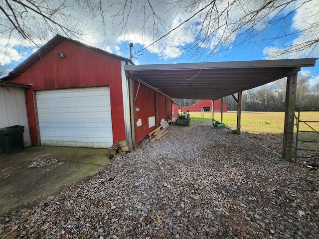 garage with a carport