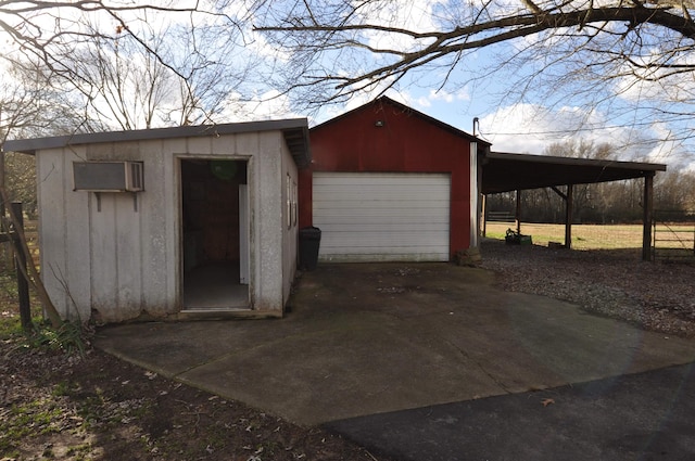 garage featuring a carport