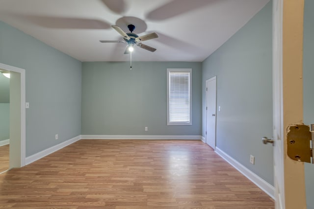 spare room featuring ceiling fan and light hardwood / wood-style floors