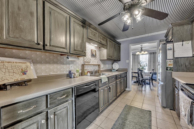  - kitchen with black dishwasher, freestanding refrigerator, tasteful backsplash, light tile patterned flooring, and electric range