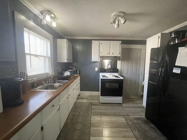 kitchen featuring sink, crown molding, black refrigerator with ice dispenser, electric range, and white cabinets