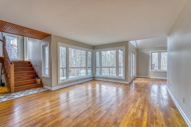 unfurnished living room with light hardwood / wood-style flooring