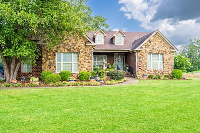 view of front of home with a front lawn