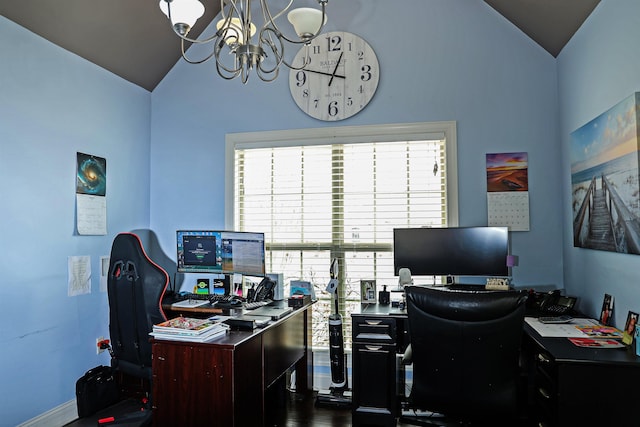 office area with lofted ceiling and an inviting chandelier