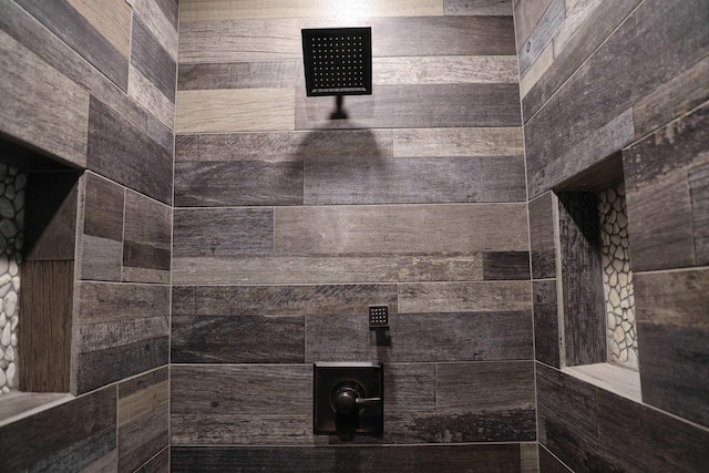 full bathroom with tiled shower