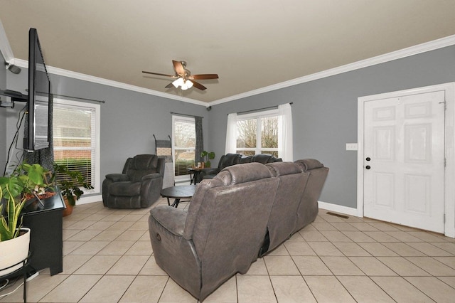 tiled living room with ceiling fan and ornamental molding