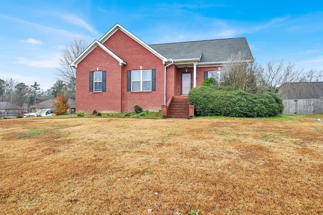 view of front of property with a front lawn