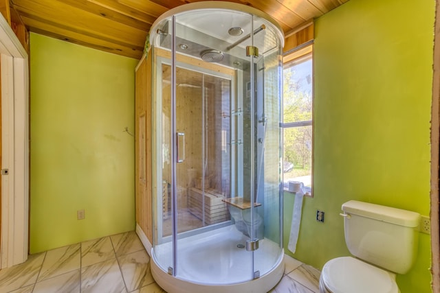 bathroom featuring toilet, wood ceiling, and walk in shower