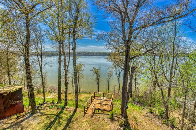 view of home's community featuring a water view